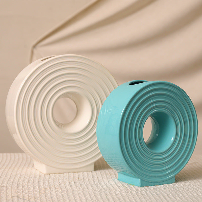 Classic round wheel ceramic vases in white and turquoise porcelain for table decor