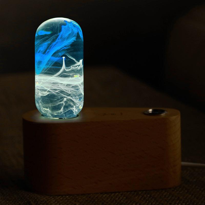 Light Bar Light with blue and white glowing projection on wooden base in dark room